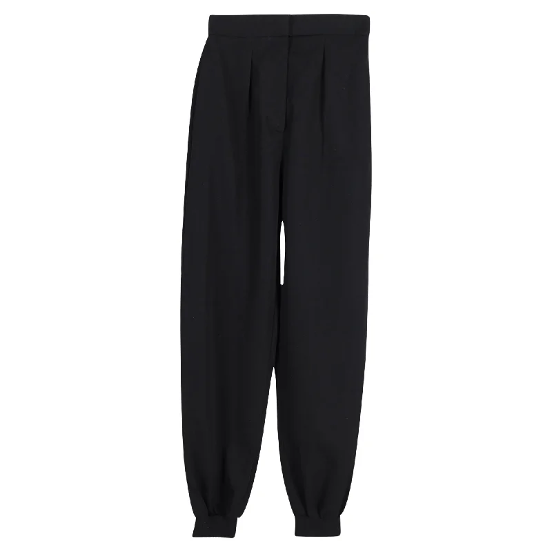 Stella McCartney Pleated Tapered Trousers in Black Wool